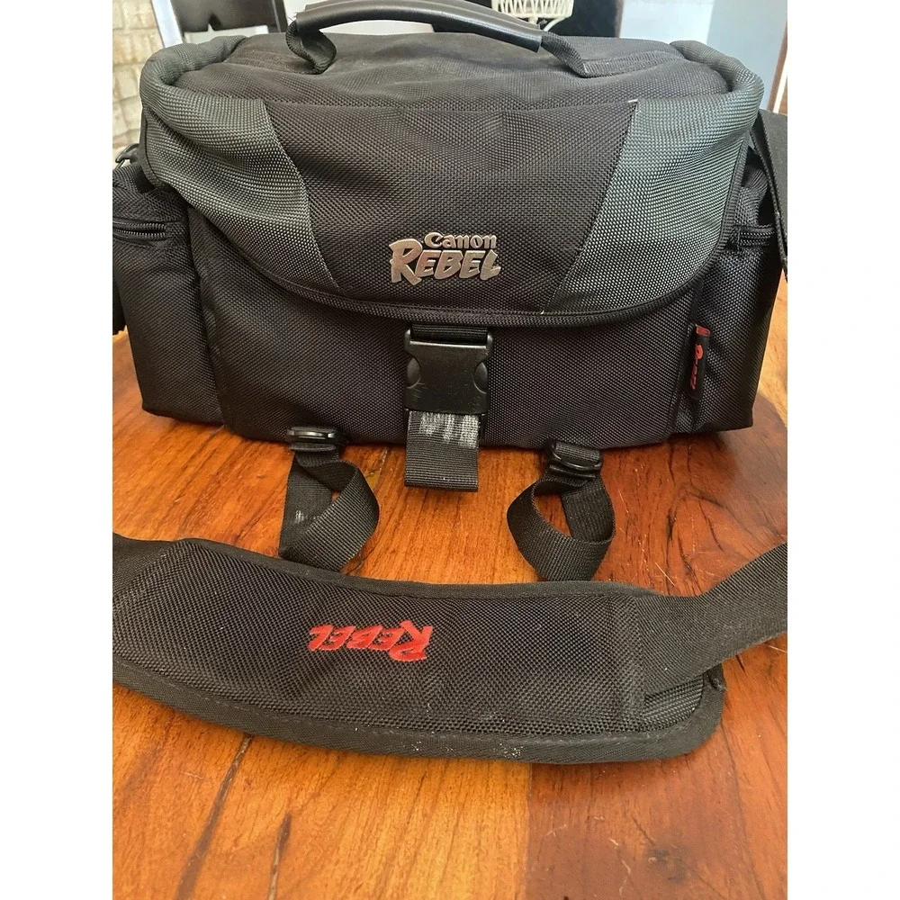 Canon EOS Rebel T3I 18 MP Digital SLR Camera with two Lenses, Charger And Bag